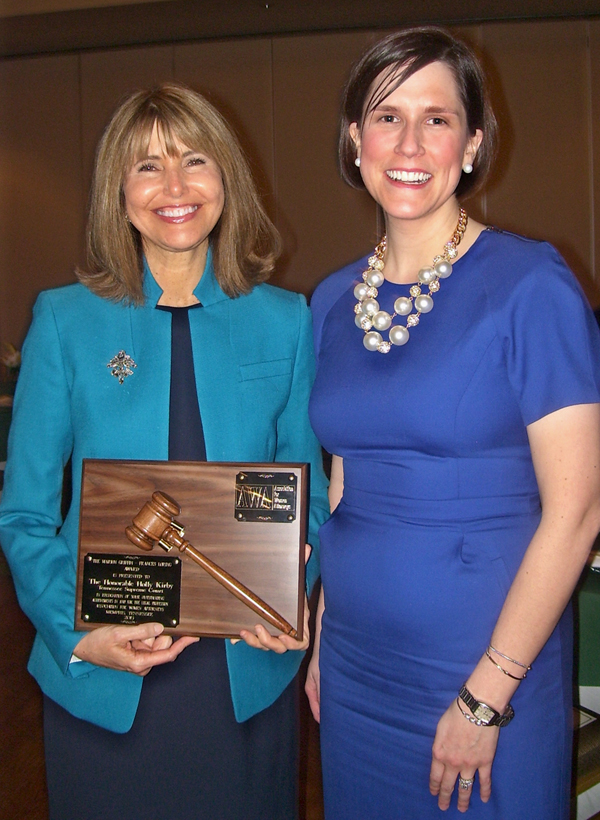 Justice Holly Kirby with honoree plaque and AWA President Keating Lowery.   Justice Kirby is the 26th recipient of the Marion Griffin-Frances Loring Award for outstanding achievement in the legal profession. 