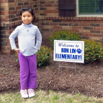 Karisse Mopal and her Bon Lin Elementary sign